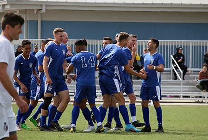 Air Force celebrates their first goal of the championship match against Navy. during the 2022 Armed Forces Men’s Soccer Championship hosted by MacDill Air Force Base in Tampa, Florida from March 6-12. 1st Lt. James Souder (second from right) of Tinker Air Force Base, Okla. scored two goals, including this one. The best players from the Army, Marine Corps, Navy and Air Force (with Space Force players) compete for gold. (Photo by Ms. Arianna Dinote, Department of Defense Photo - Released)
