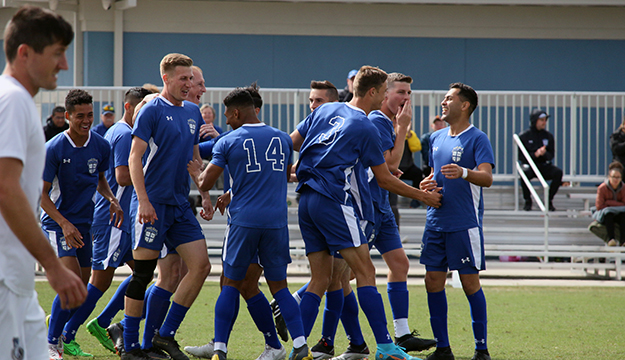 Air Force celebrates their first goal of the championship match against Navy. during the 2022 Armed Forces Men’s Soccer Championship hosted by MacDill Air Force Base in Tampa, Florida from March 6-12. 1st Lt. James Souder (second from right) of Tinker Air Force Base, Okla. scored two goals, including this one. The best players from the Army, Marine Corps, Navy and Air Force (with Space Force players) compete for gold. (Photo by Ms. Arianna Dinote, Department of Defense Photo - Released)
